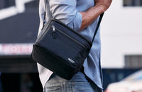 
              PackIt Freezable Essential Cooler, Black, Built with ECOFREEZE Technology, Fully Freezable, Collapsible, Reusable, with Removable Crossbody Strap, Top Clip Handle, Designed for Fresh Office
            