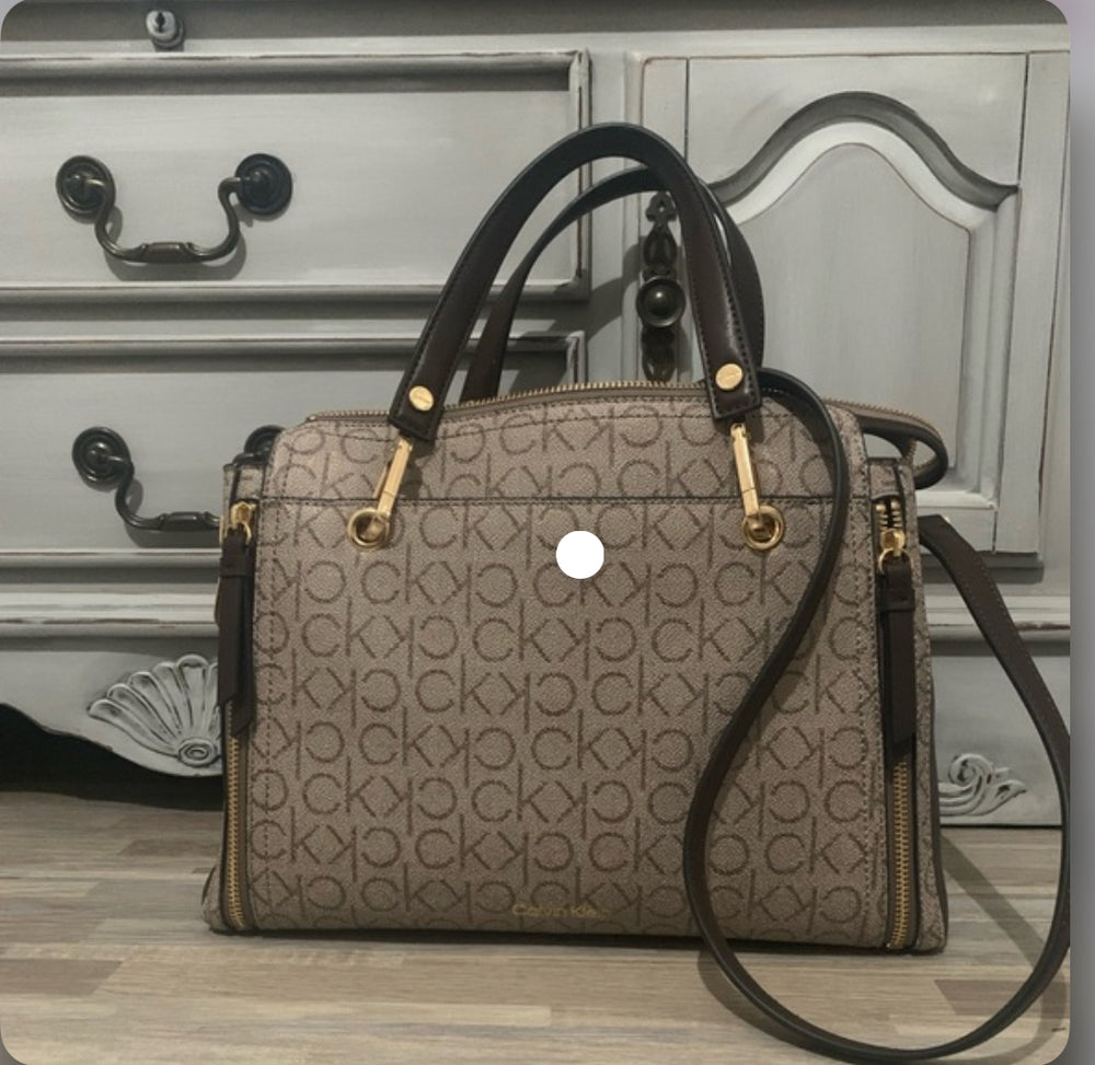 Calvin Klein (rare color) Pristine Garnet Satch