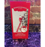 
              Wondershop Small Animated Climbing Santa Table Top Decorative Figurine
            